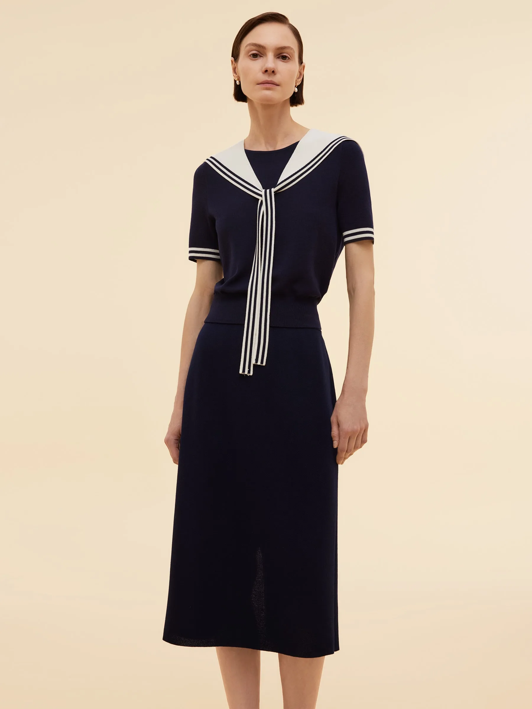 Tencel Blend Knit Top And Column Skirt Two-Piece Set sold by Goelia