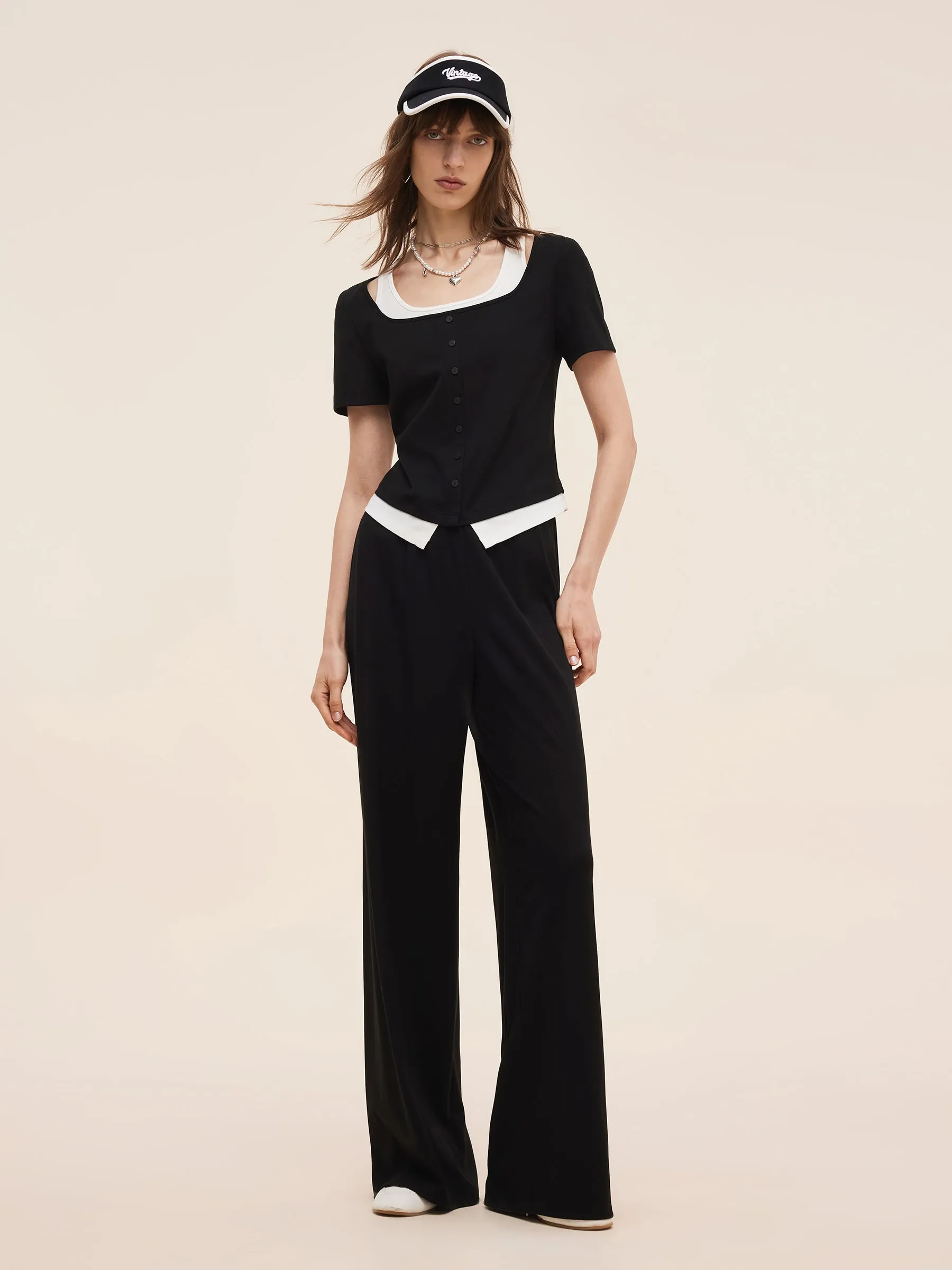 Mock Layered Knit Top And Pants Two-Piece Set sold by Goelia