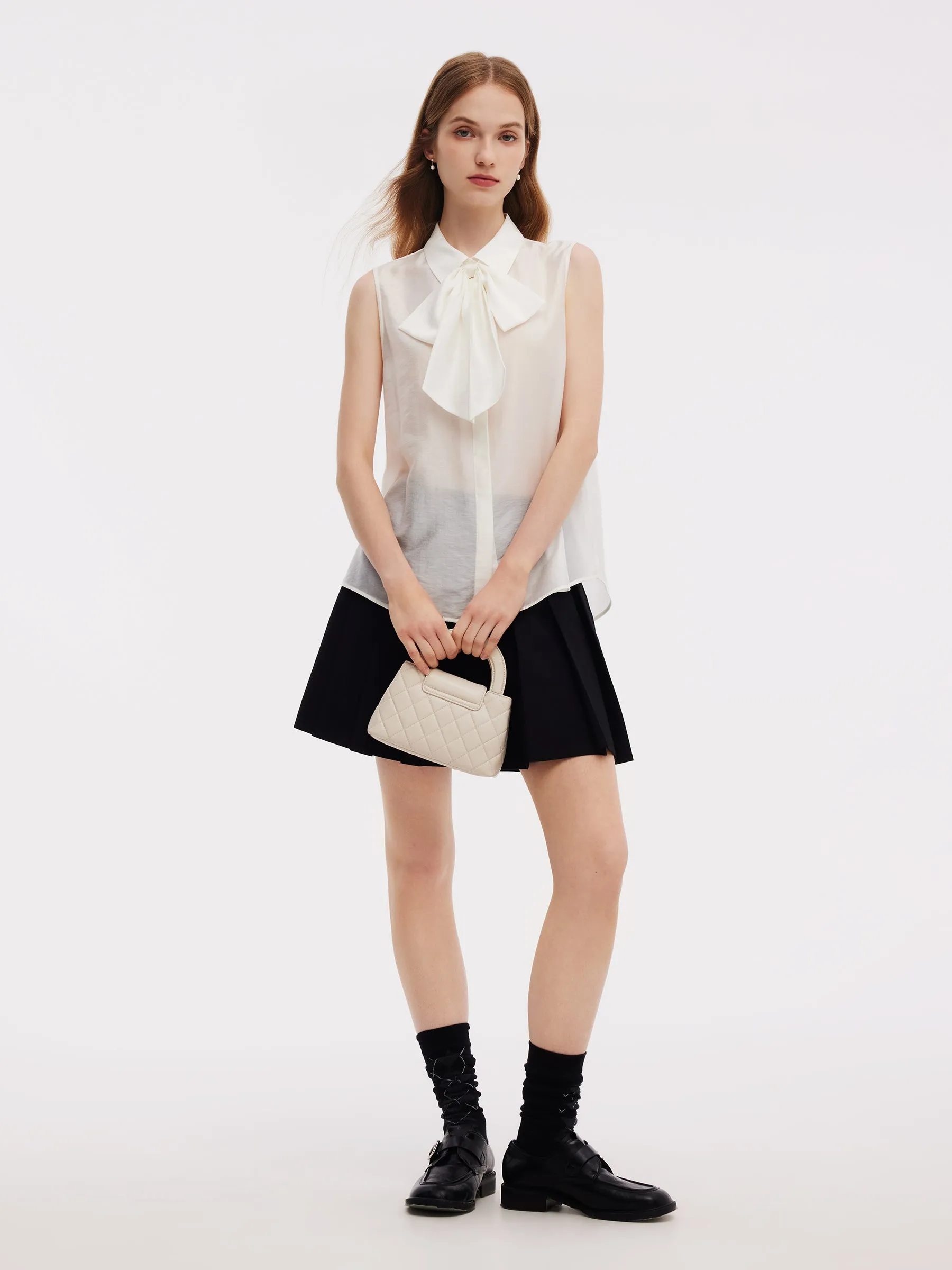 Front Slit Knit Top And Sleeveless Shirt Two-Piece Set sold by Goelia product image thumbnail 3