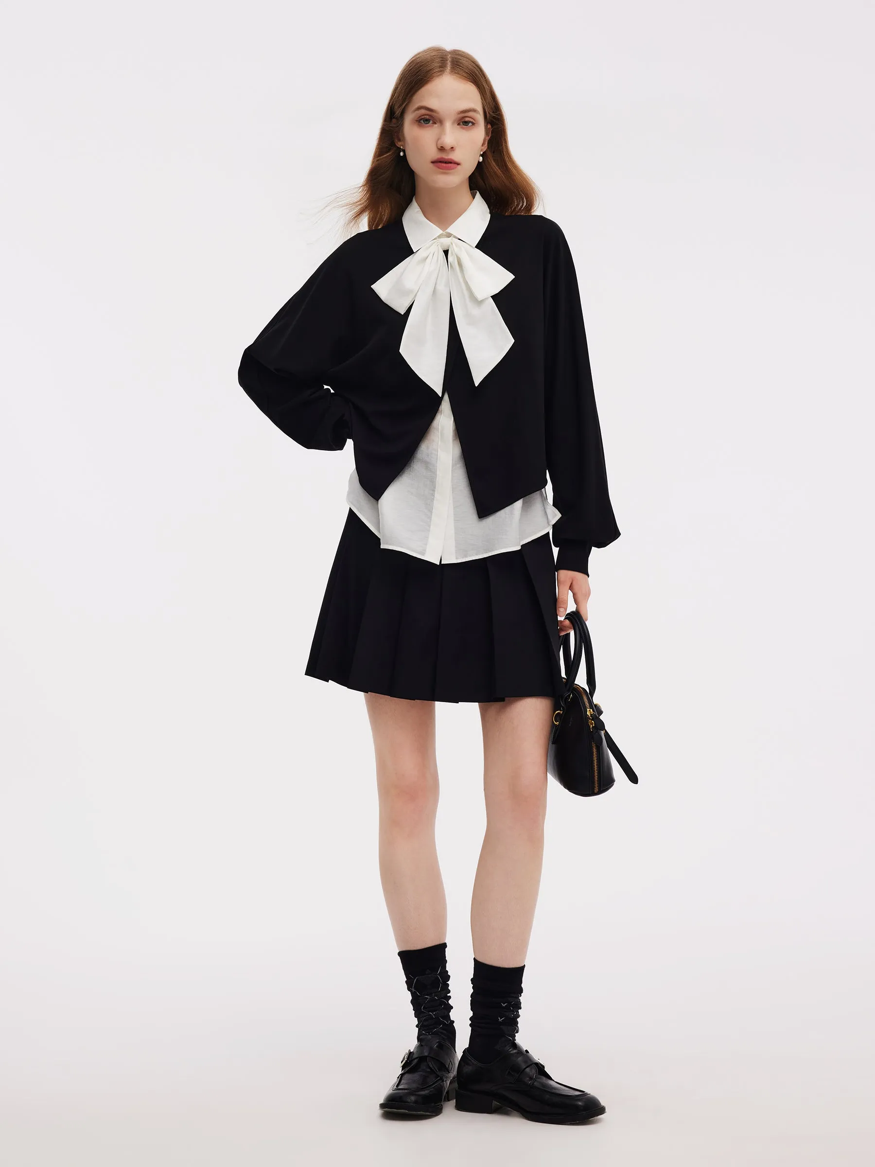 Front Slit Knit Top And Sleeveless Shirt Two-Piece Set sold by Goelia product image thumbnail 2