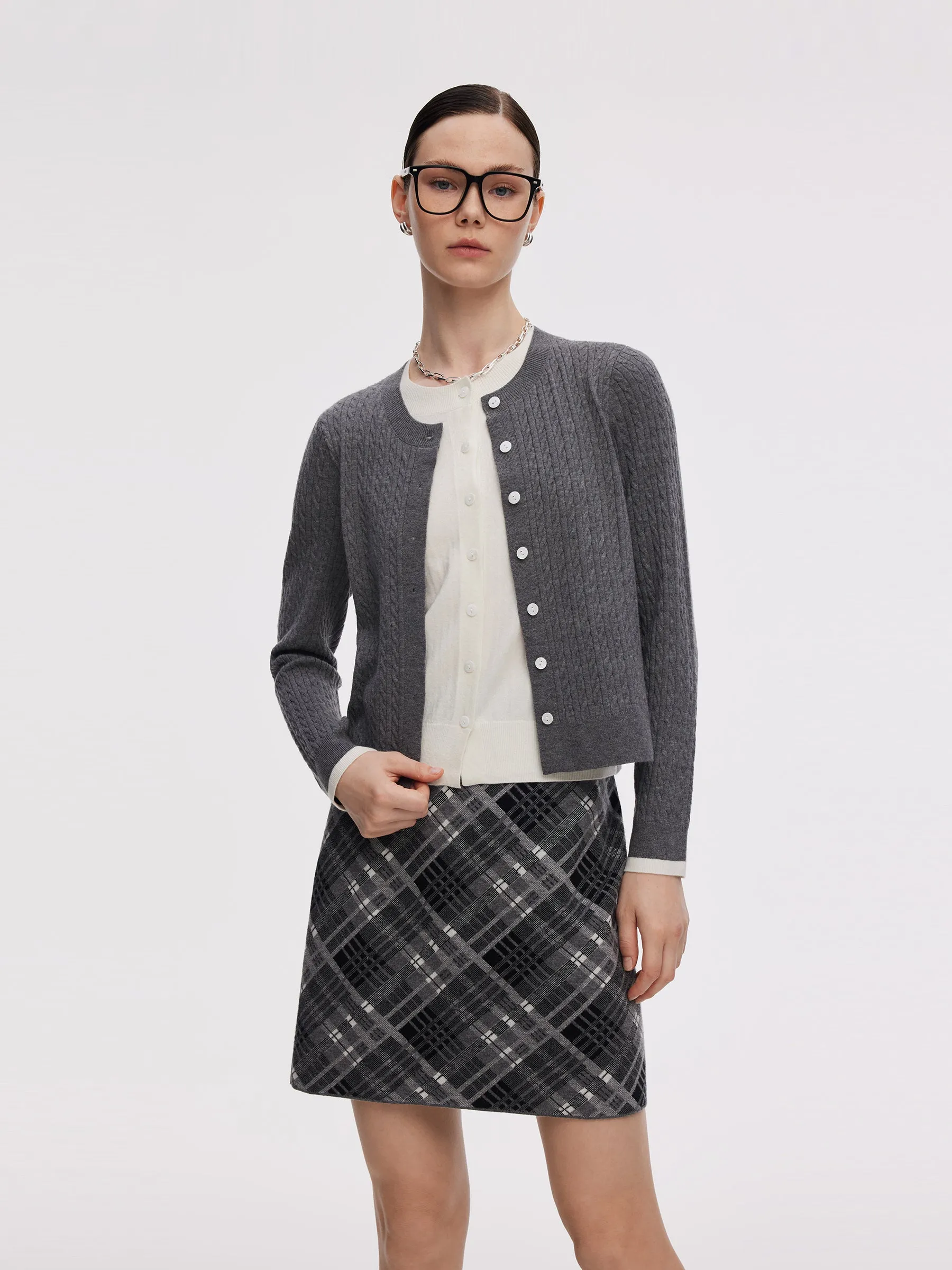 Faux Two-Piece Cardigan And Plaid Skirt Two-Piece Set sold by Goelia
