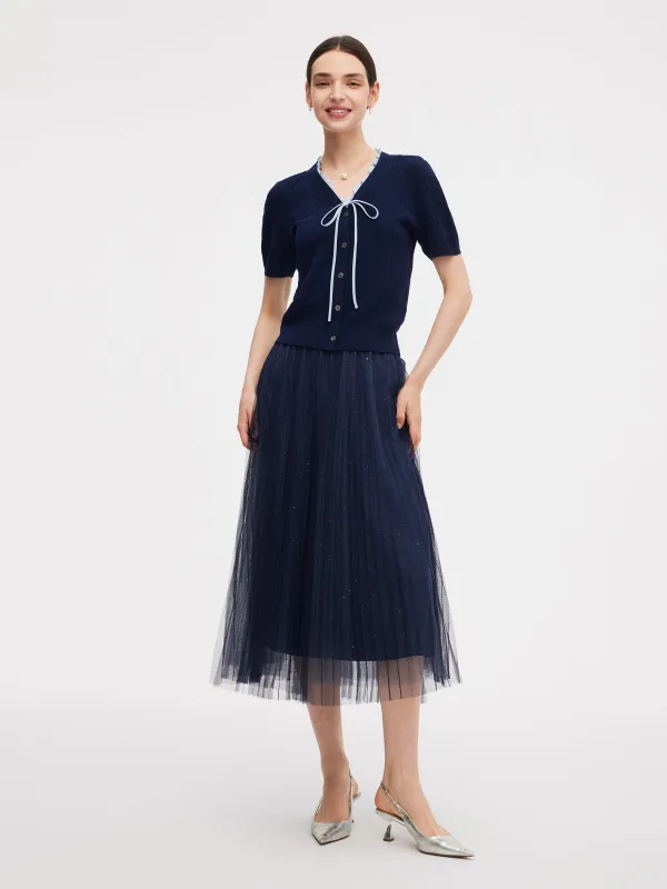 Ruffle V-Neck Knit Top And Pleated Mesh Skirt Two-Piece Set sold by Goelia