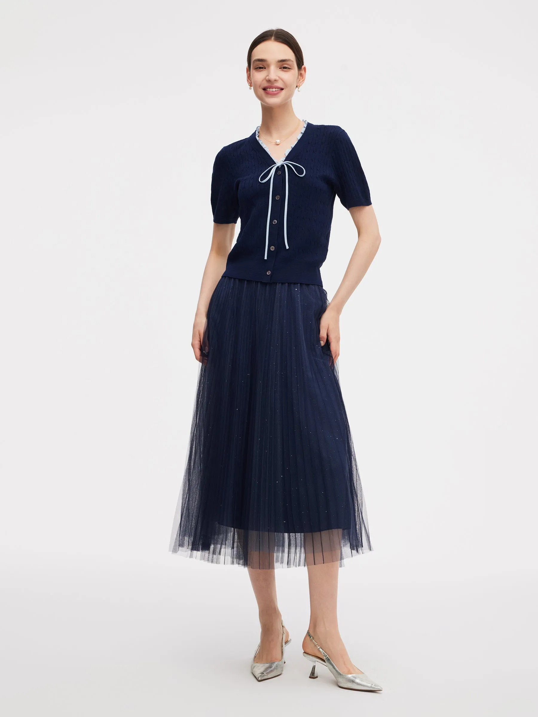 Ruffle V-Neck Knit Top And Pleated Mesh Skirt Two-Piece Set sold by Goelia