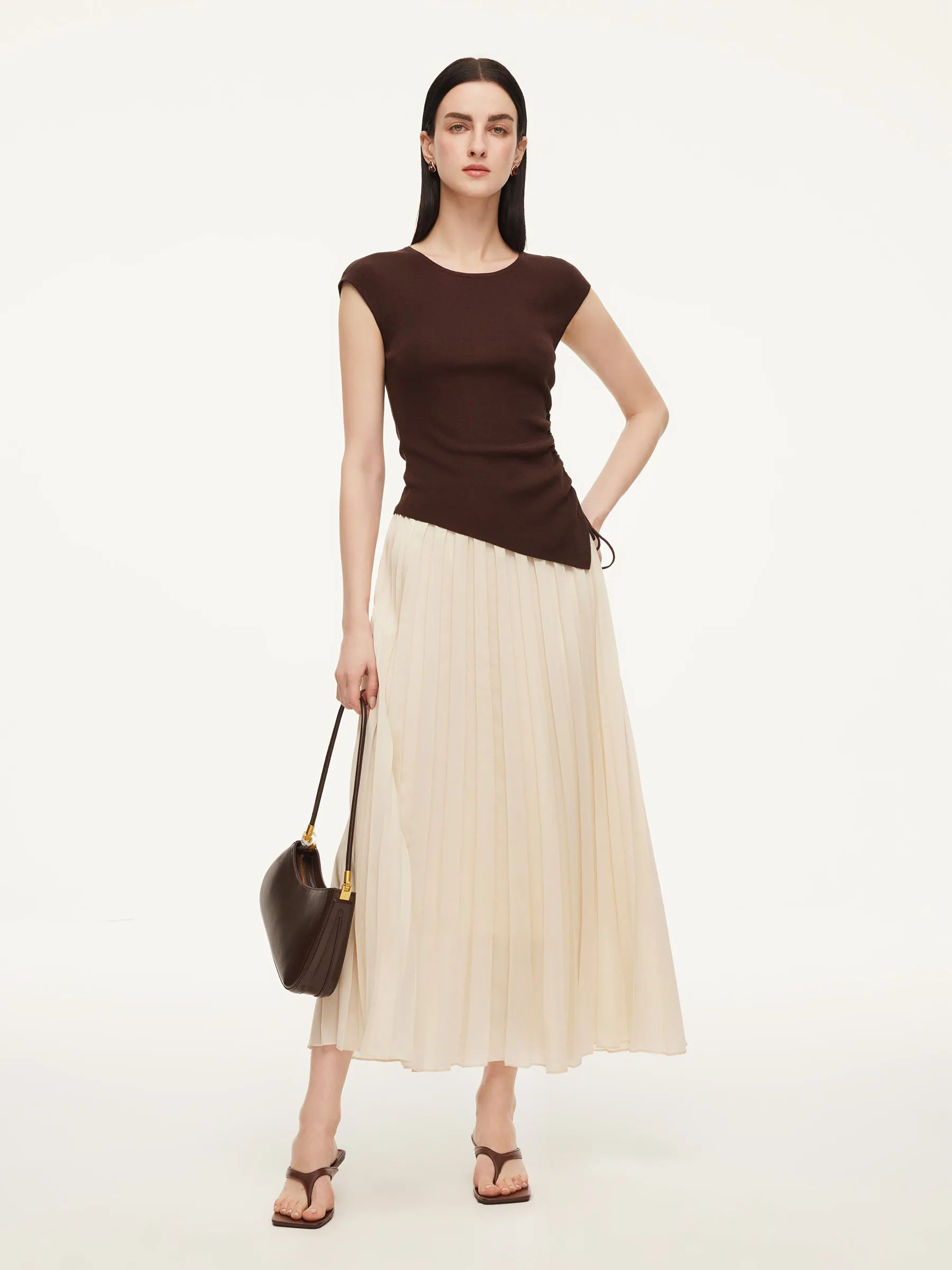 Modal Acetate Blend Asymmetrical Hem Knit Top And Pleated Skirt Two-Piece Set sold by Goelia
