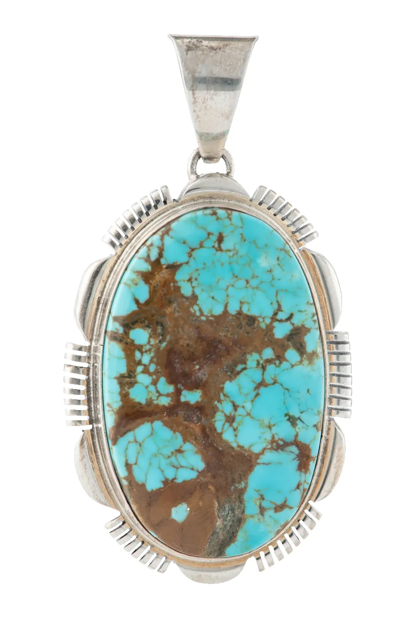 Turquoise & Silver Pendant sold by Pinto Ranch