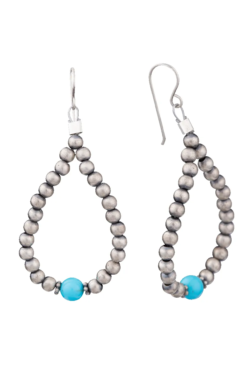 Navajo Pearl Turquoise Teardrop Earrings sold by Pinto Ranch