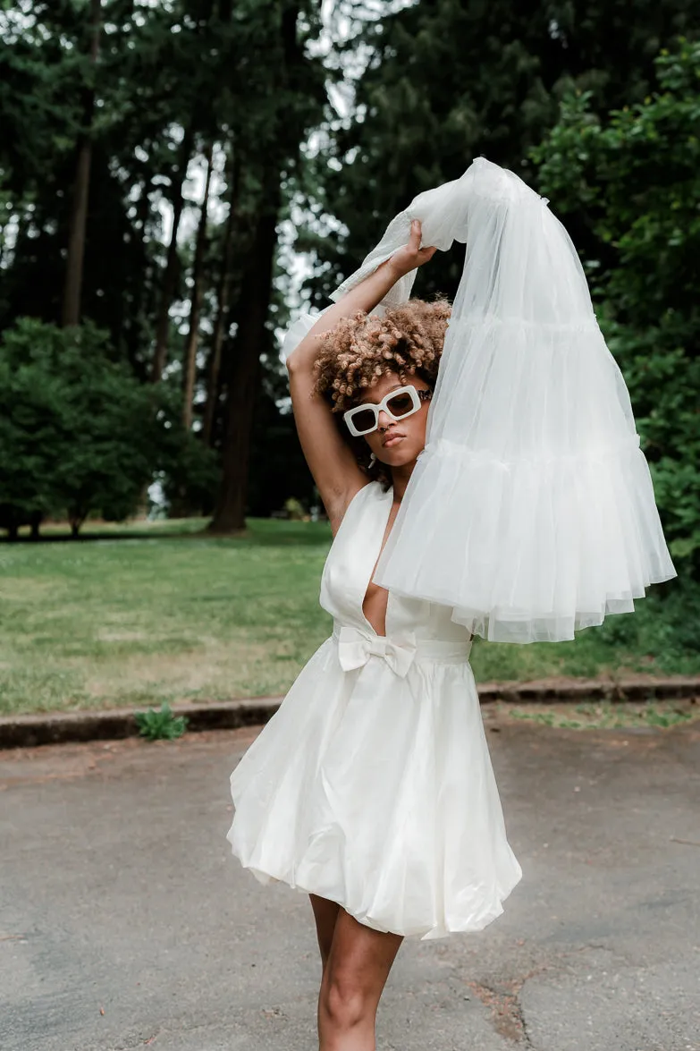 Satin Bow Bubble Hem Mini Dress sold by Confête