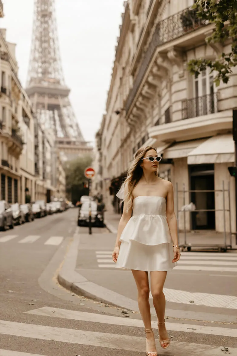 City Lights White Tiered Mini Dress sold by Confête