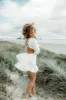 Rya White Silky Cutout Mini Dress sold by Confête
