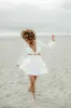 Rya White Silky Cutout Mini Dress sold by Confête