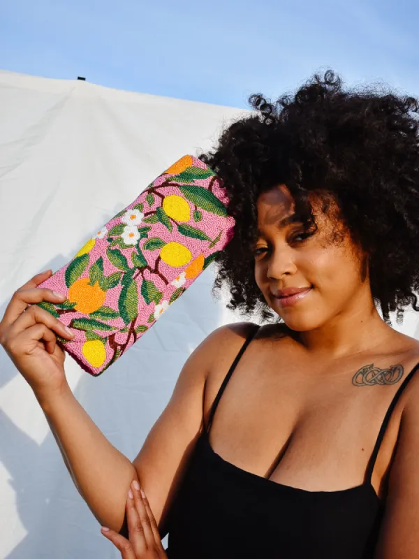 Beaded Citrus Print Clutch sold by Confête