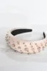 Padded Crystal Dot Headband sold by Confête