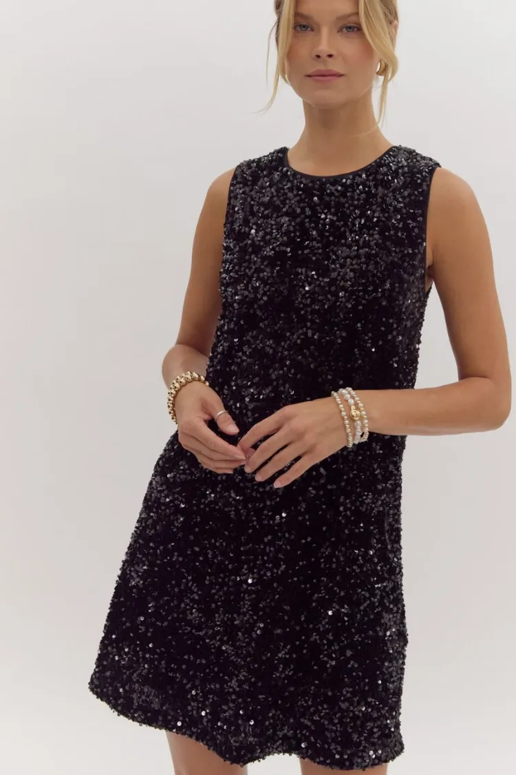 Irina Black Sequin Sleeveless Mini Dress with Black Bow sold by Confête