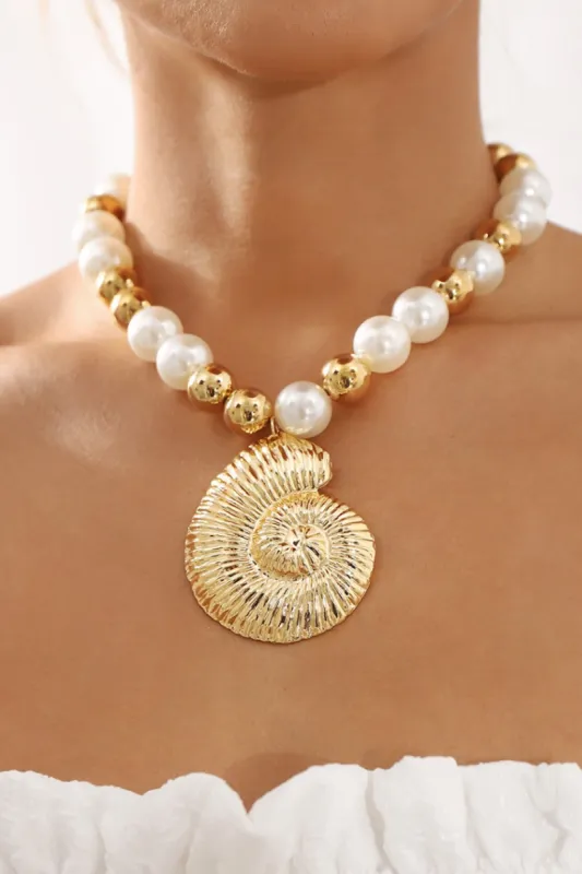 Getaway Conch Shell Necklace sold by Confête