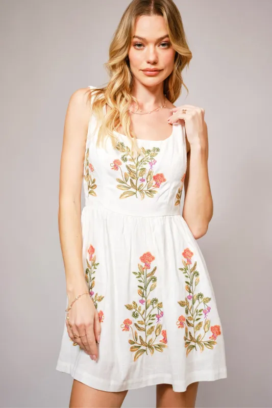 Alaria Embroidered Mini Dress sold by Confête