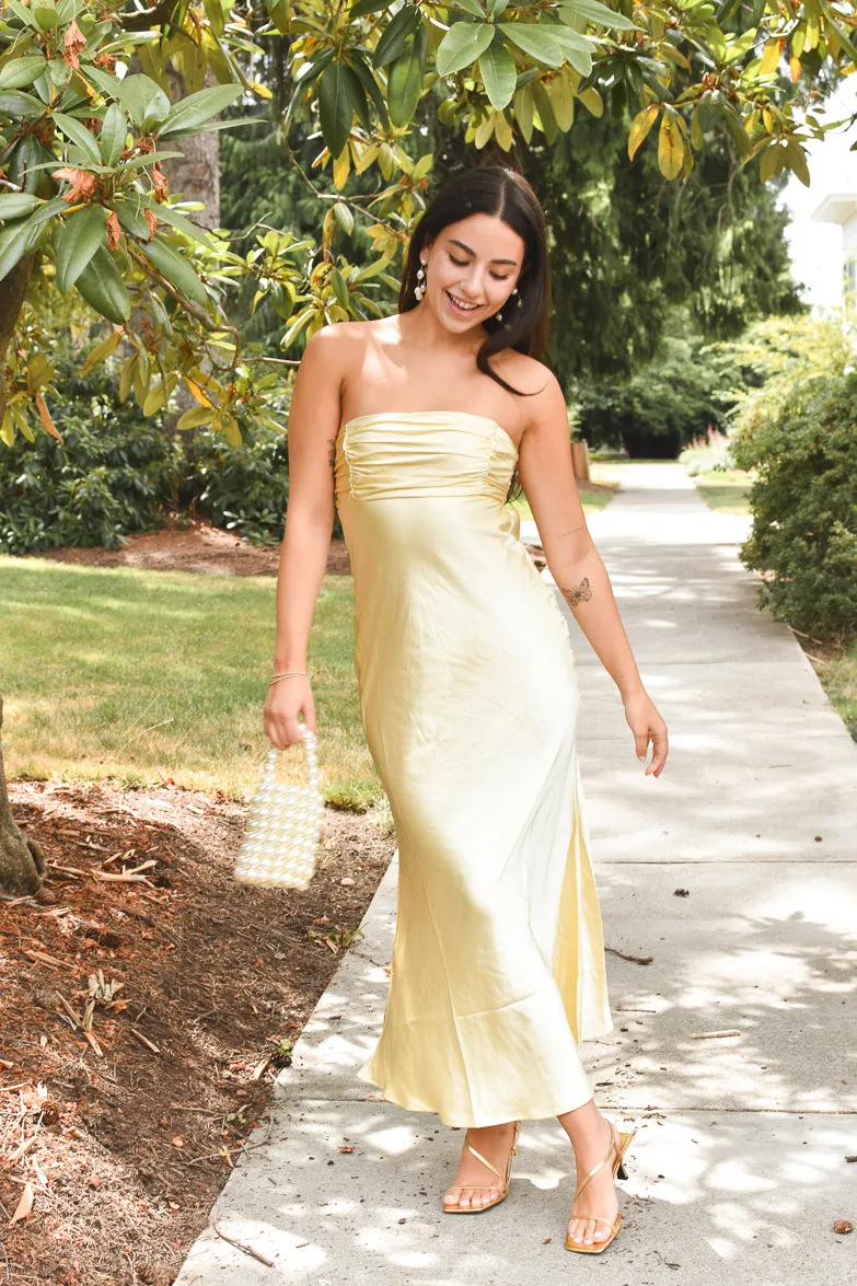 Andie Butter Yellow Silky Midi Dress sold by Confête