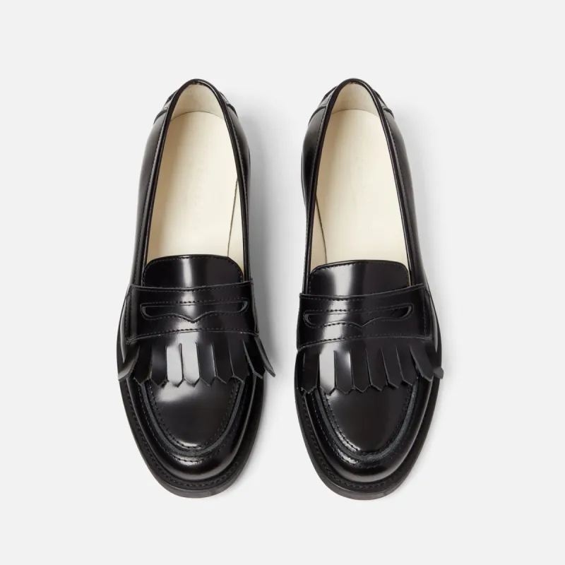 Wilde Black Fringe Penny Loafer - Women's sold by Duke + Dexter