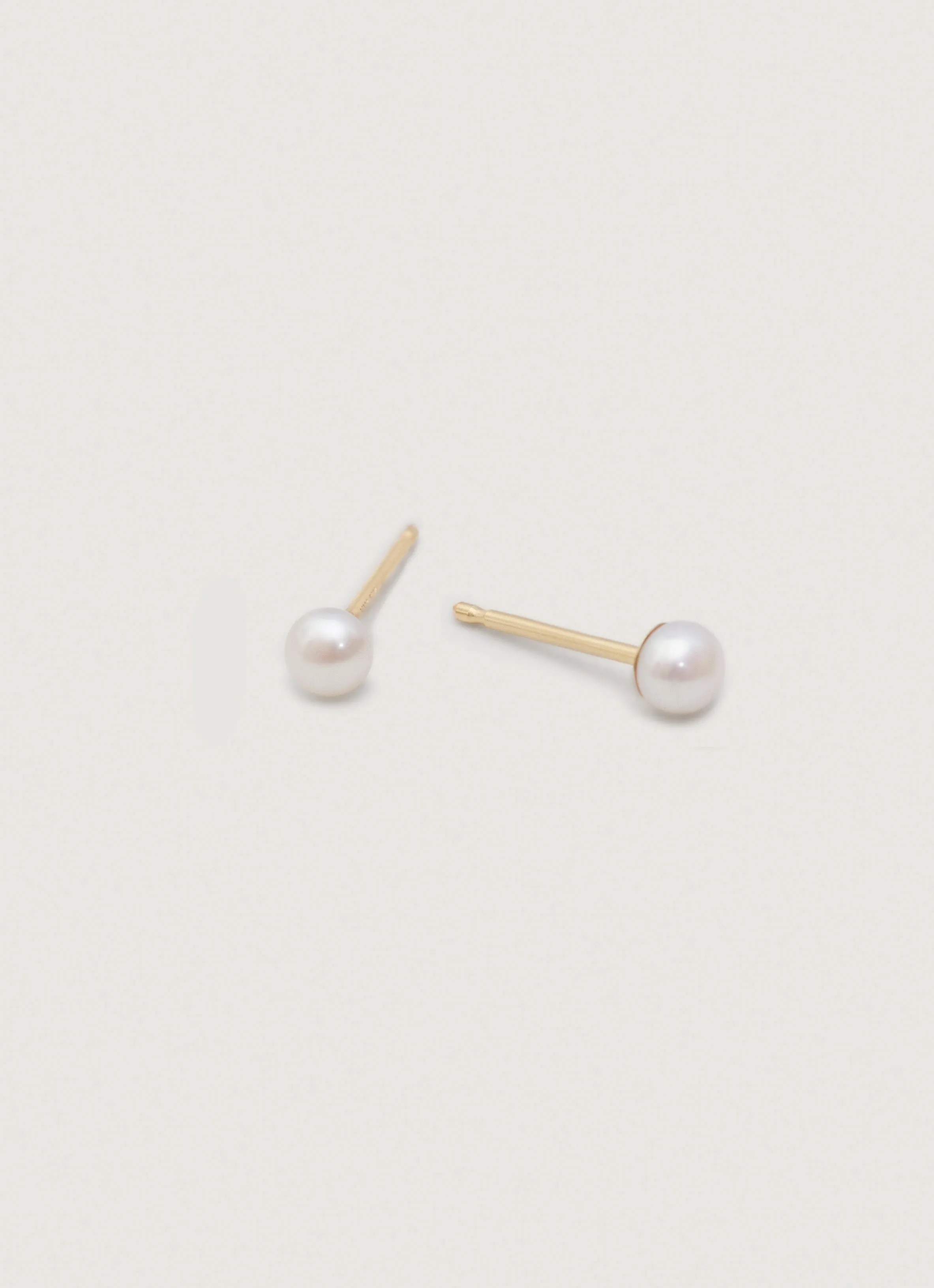 Pearl Stud Earrings sold by Kinn