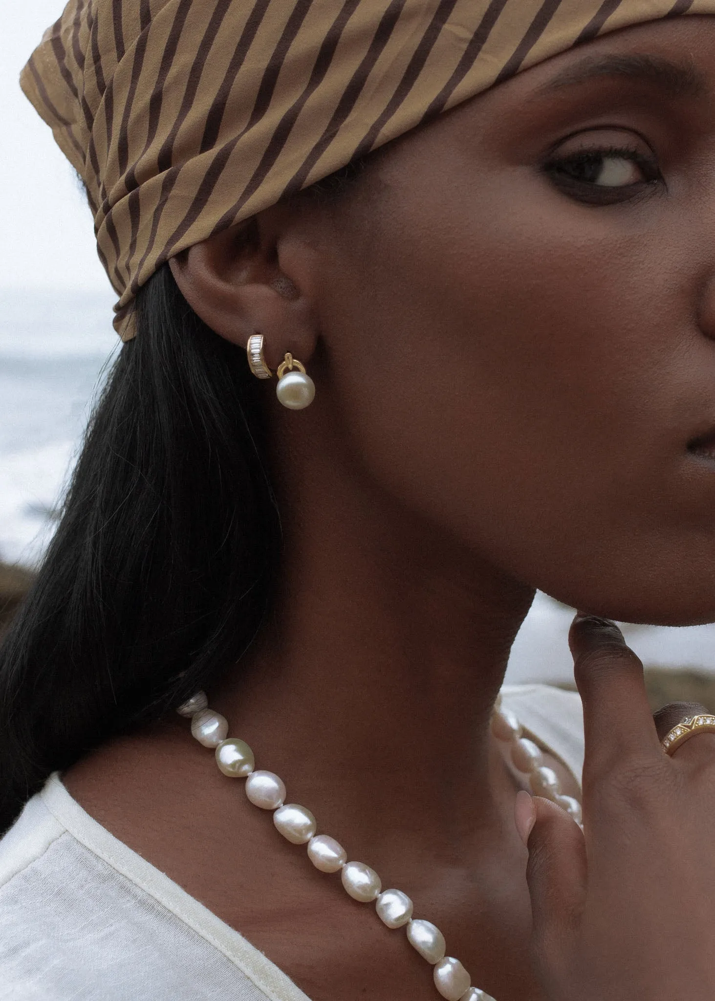 Bobbi Baguette Diamond Huggie Earrings sold by Kinn product image thumbnail 2