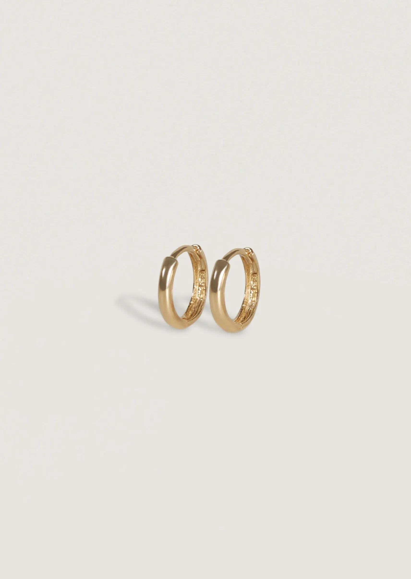 Petite Huggie Earrings sold by Kinn