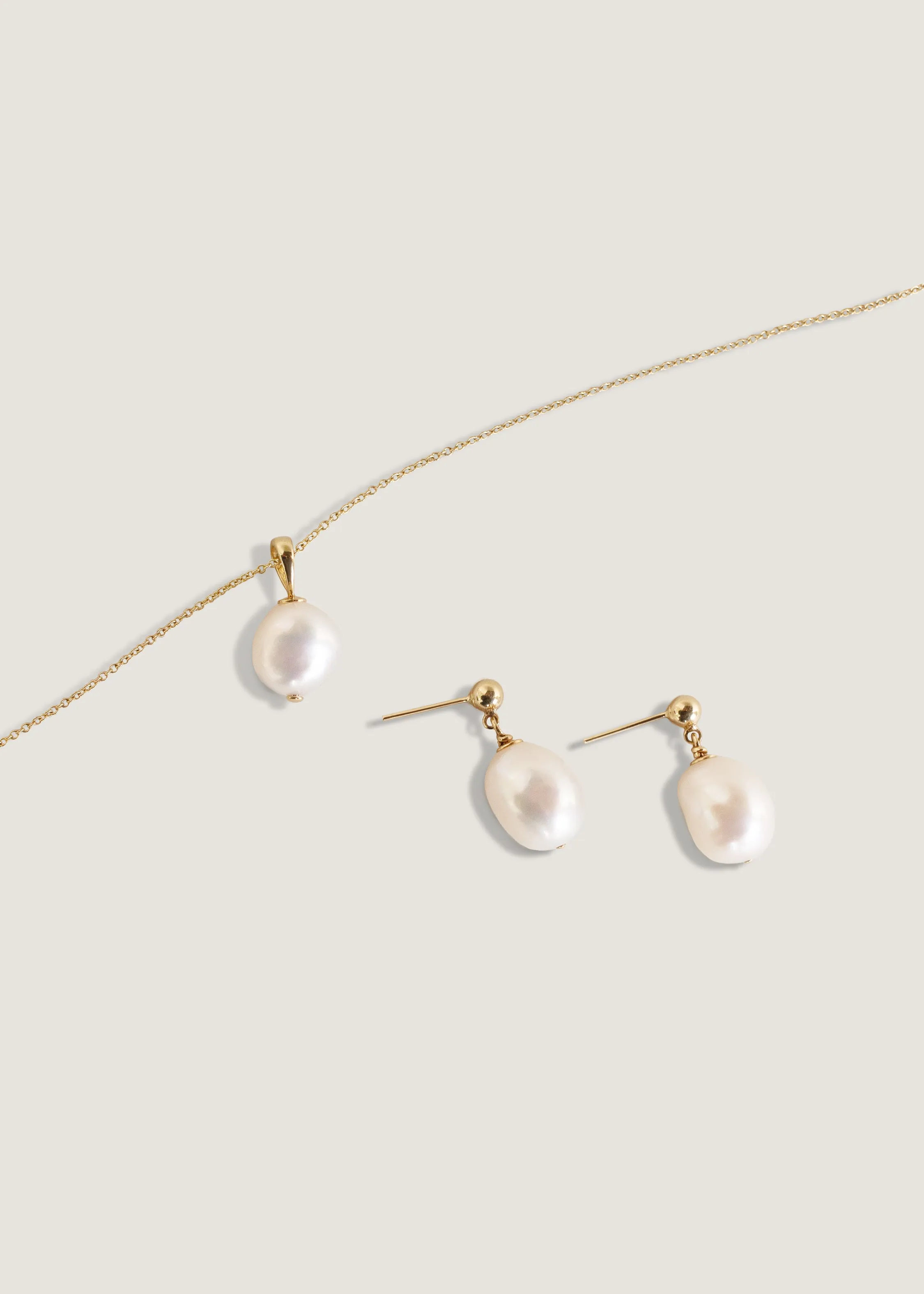 Baroque Pearl Earrings & Necklace Stack sold by Kinn