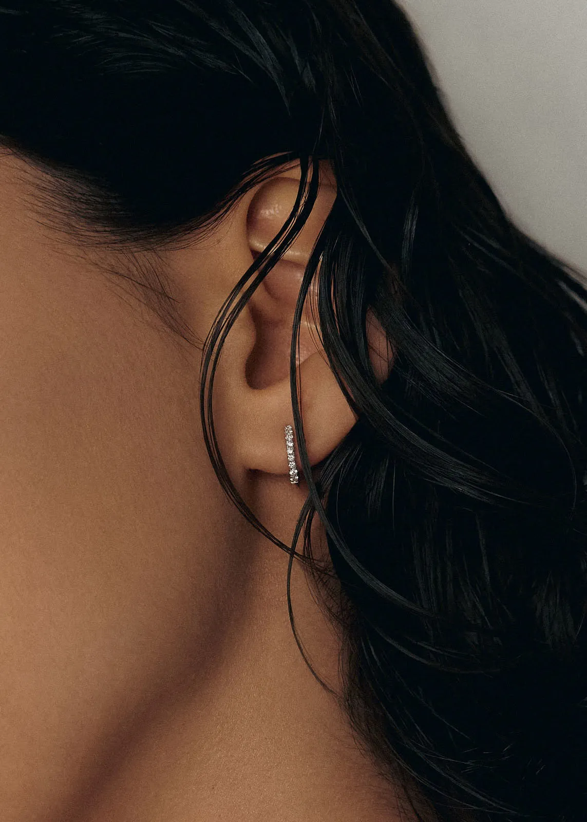 Pavé Huggie Earrings Diamond sold by Kinn product image thumbnail 2