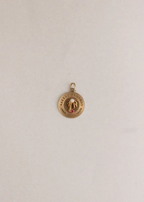 Vintage Nassau Bahamas Pearl Charm sold by Kinn