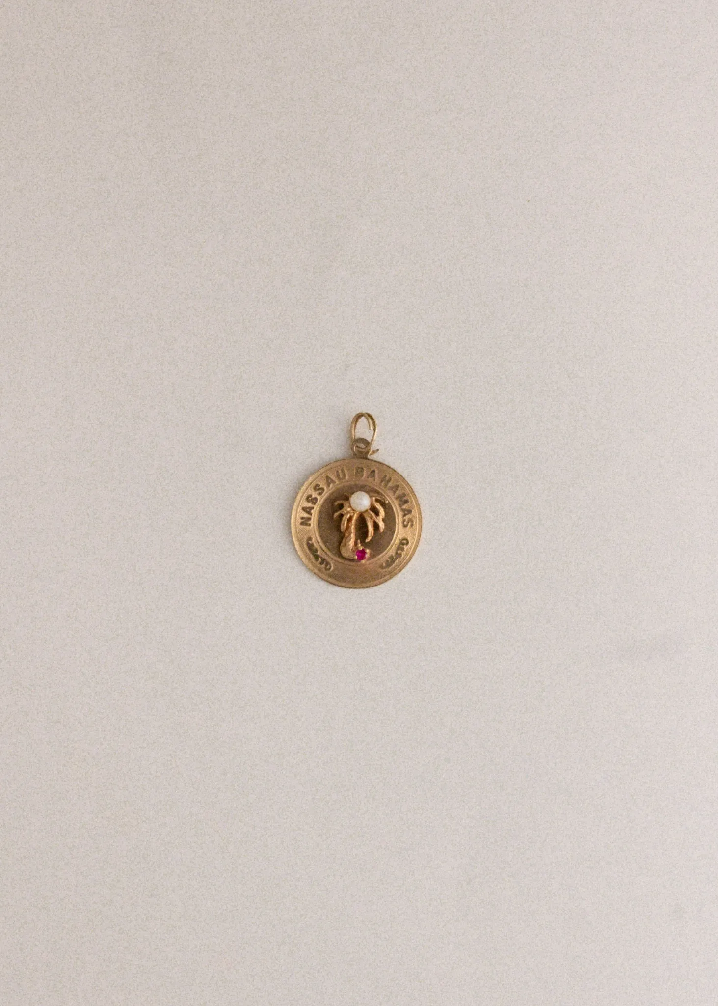 Vintage Nassau Bahamas Pearl Charm sold by Kinn