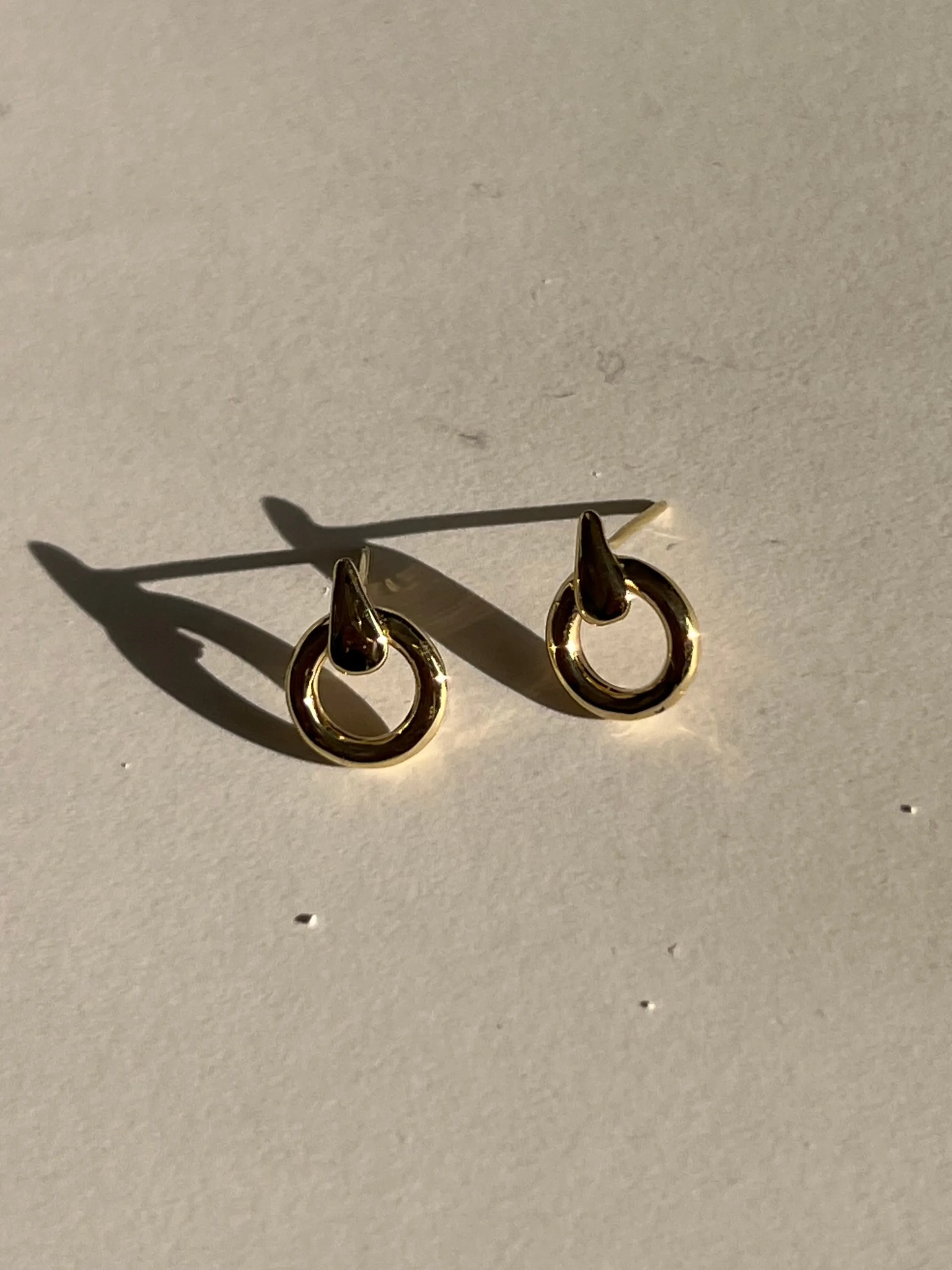 Archive Door Knocker Earring sold by Kinn