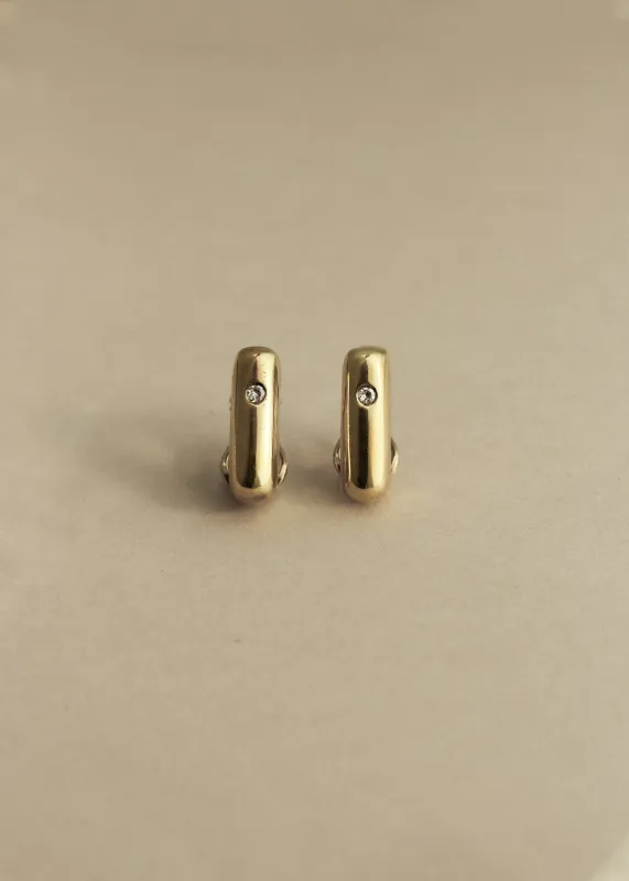 Vintage 18K Gold Tubular Hoops with Diamond sold by Kinn