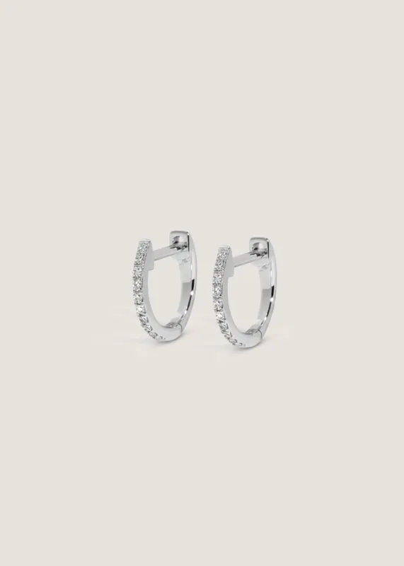 Pavé Huggie Earrings White Gold sold by Kinn
