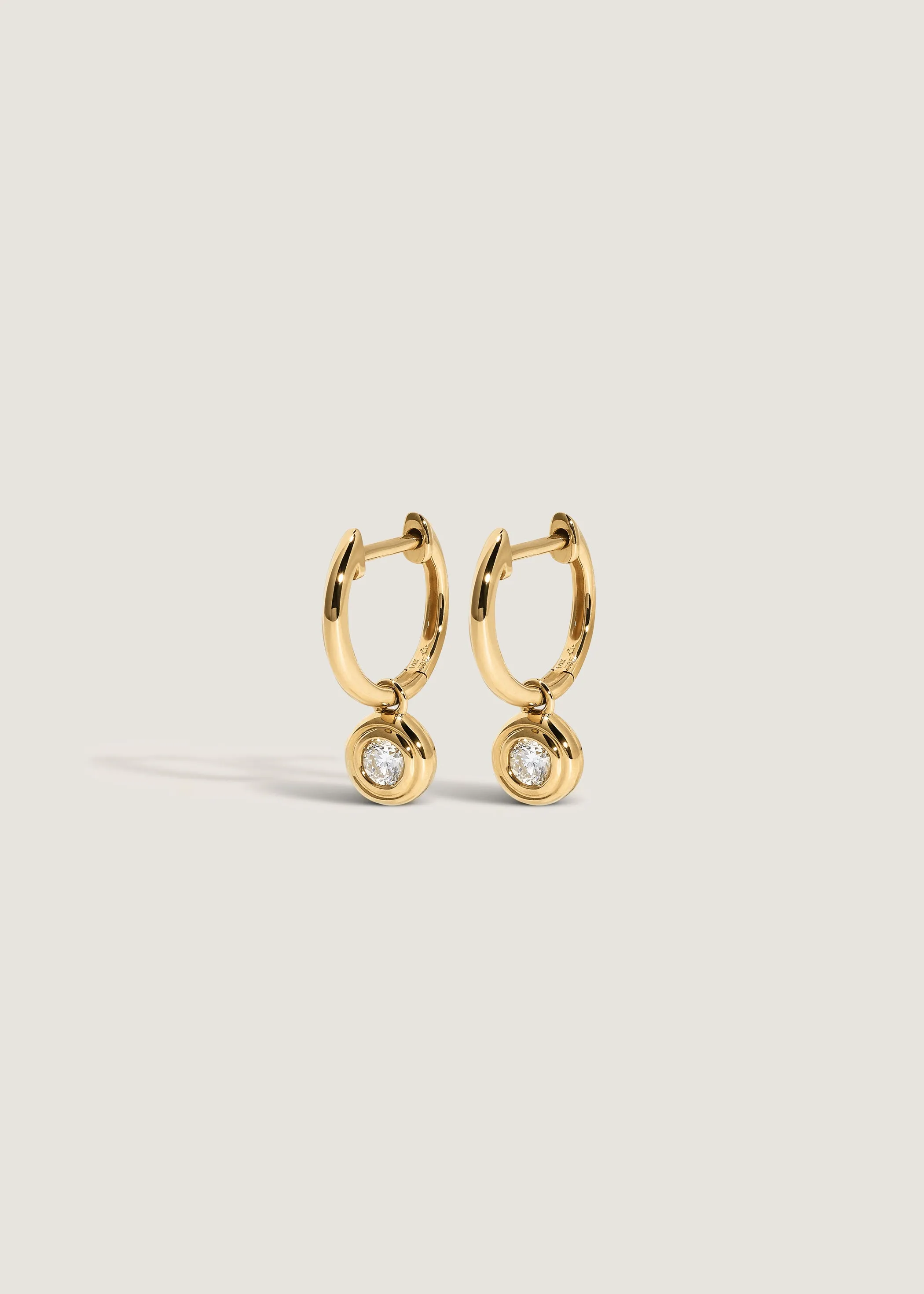 Cosette Huggie Earrings Diamond sold by Kinn