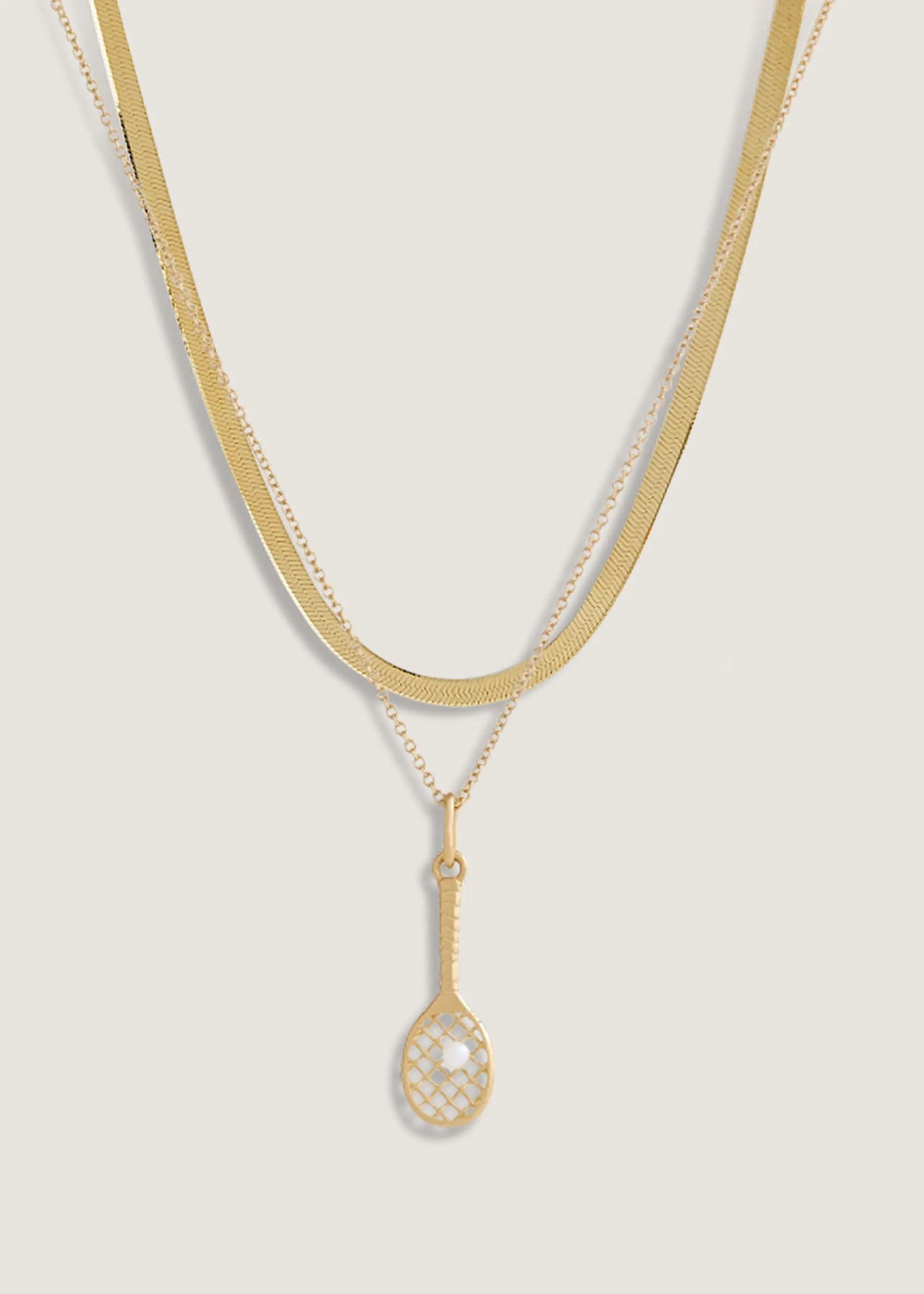 Petite Carter Herringbone & Kinn x Sunset Tennis Club Ball And Racquet Necklace Pearl Stack sold by Kinn