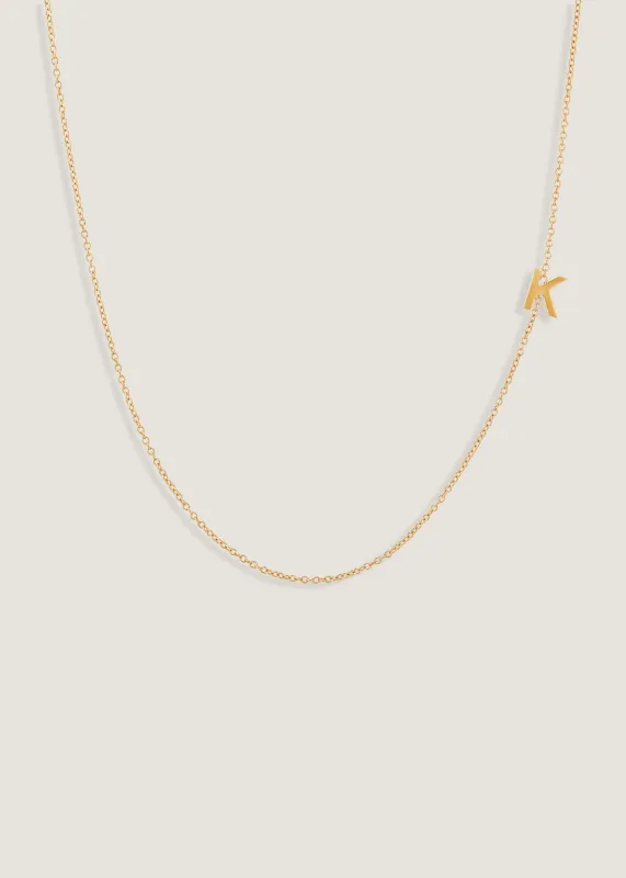Asymmetrical Initial Necklace sold by Kinn