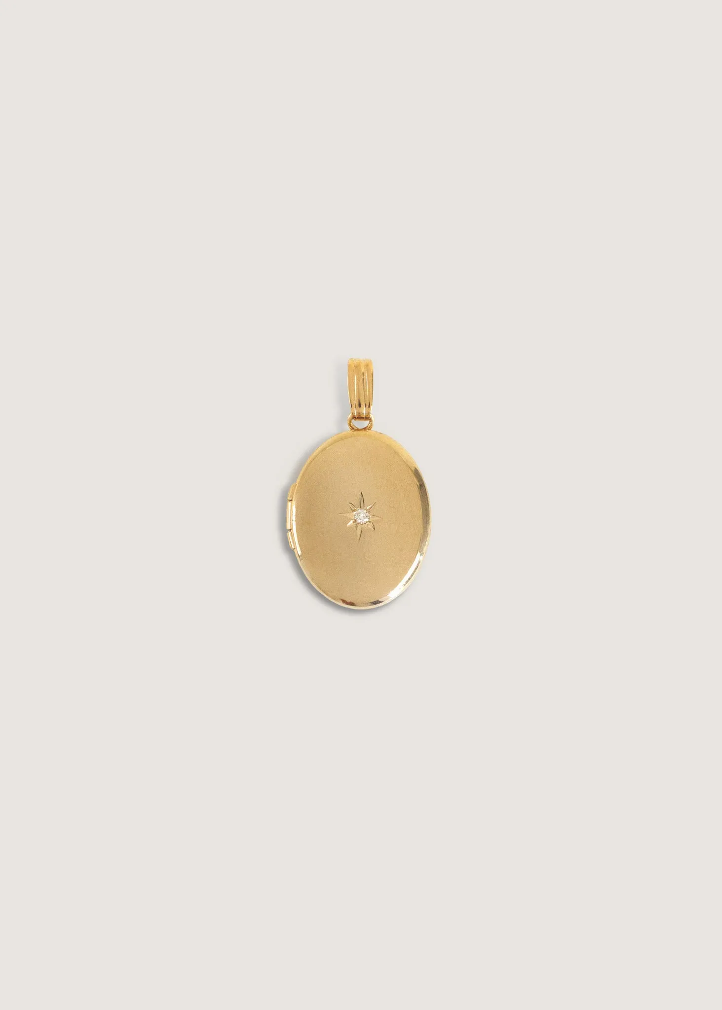 Maison Oval Locket Diamond sold by Kinn
