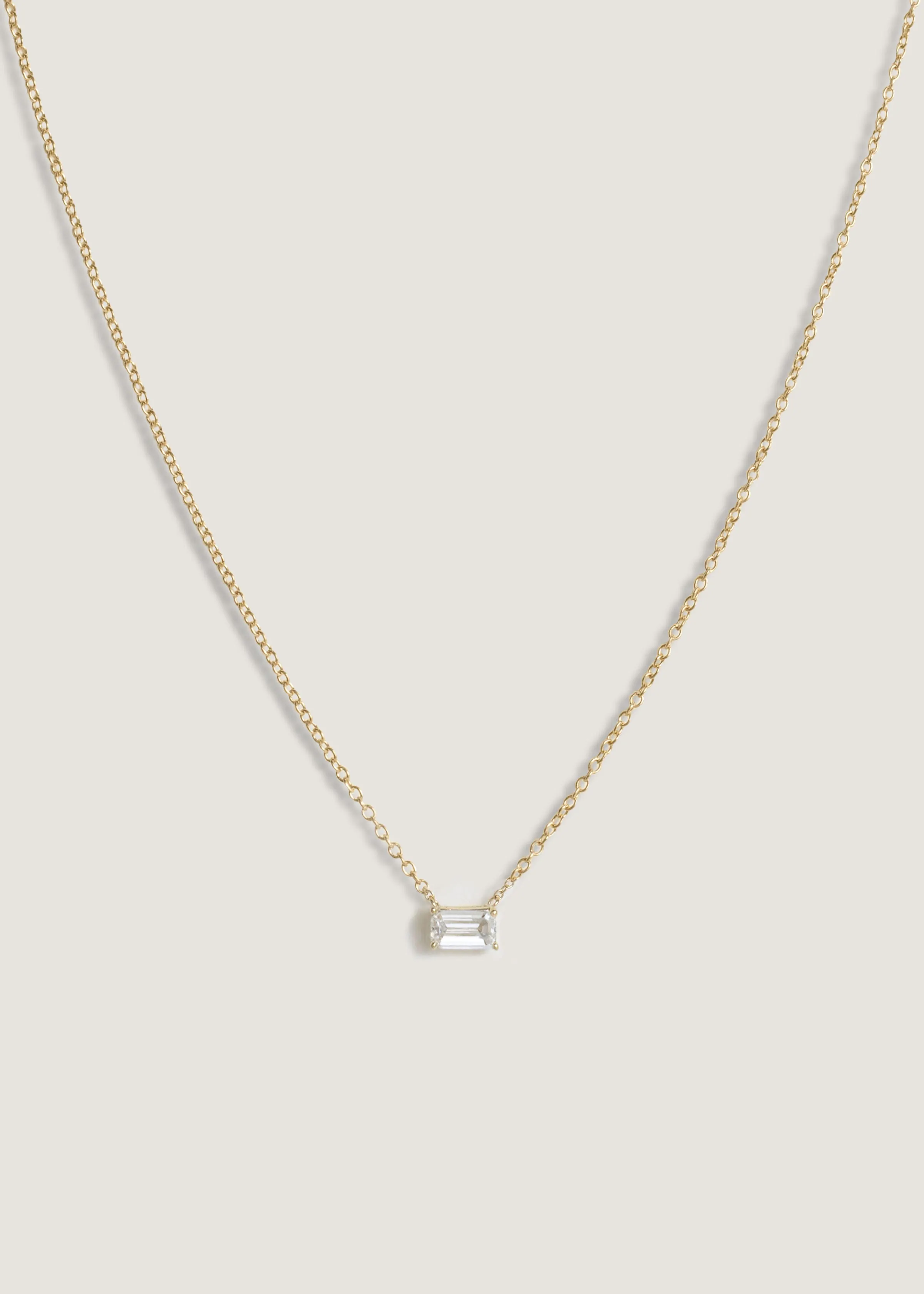 Solitaire Floating Emerald Diamond Necklace sold by Kinn