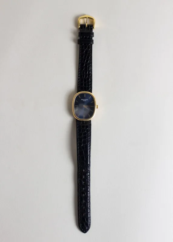 Vintage 18k Yellow Gold Patek Philippe Geneva Watch sold by Kinn