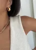 Bold Teardrop Hoop Earrings sold by Kinn