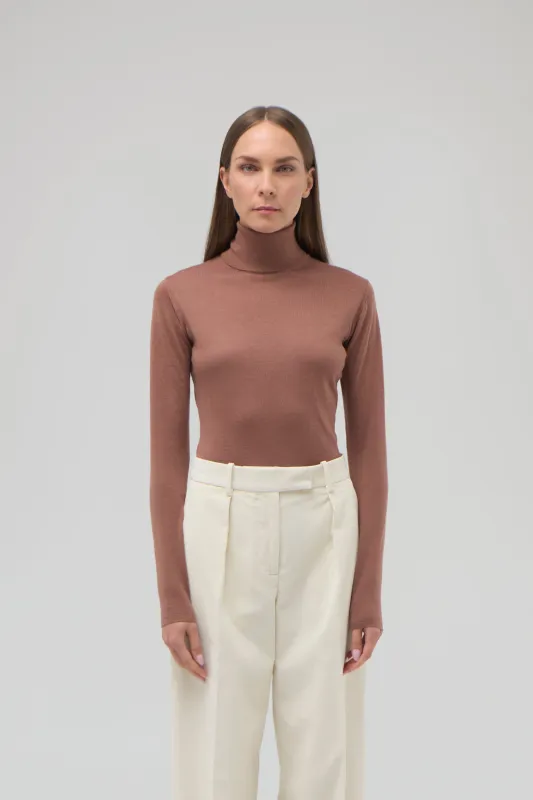 CASHMERE SILK FITTED TURTLENECK sold by RENGGLI