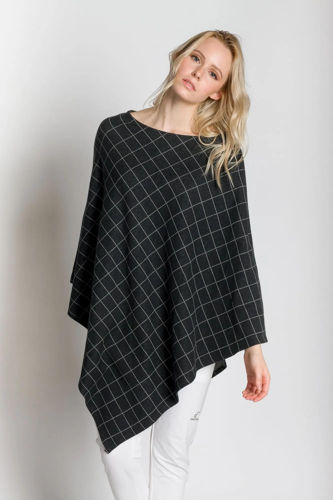 The Women's Wanderer Poncho sold by Ably Apparel