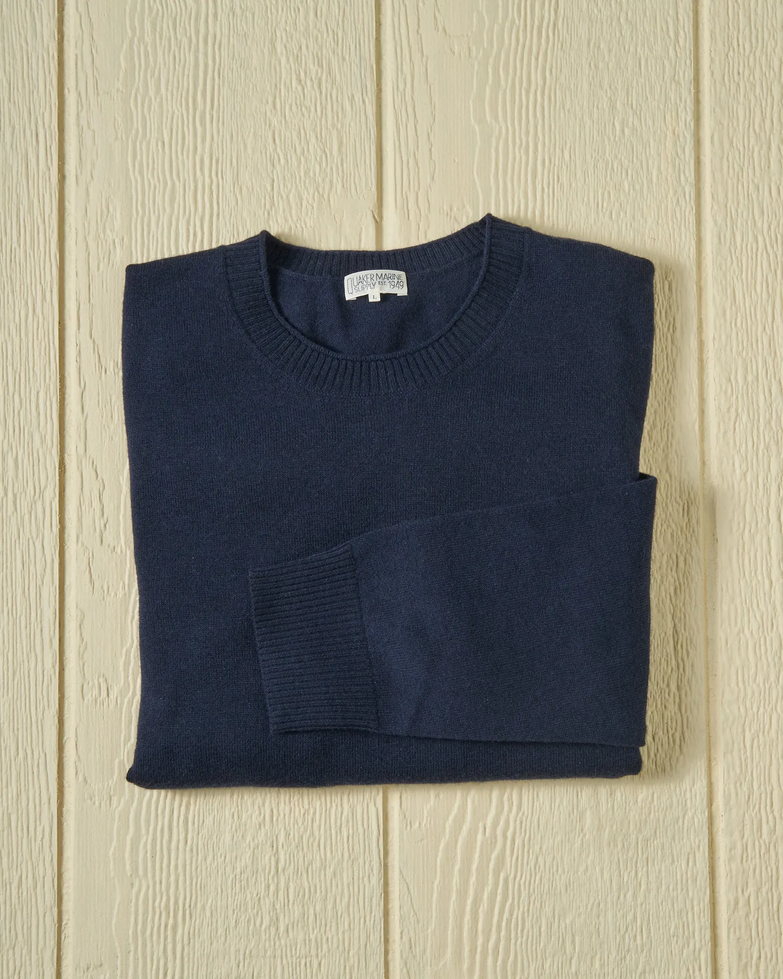 Merino Roll Neck Sweater in Navy sold by Quaker Marine Supply