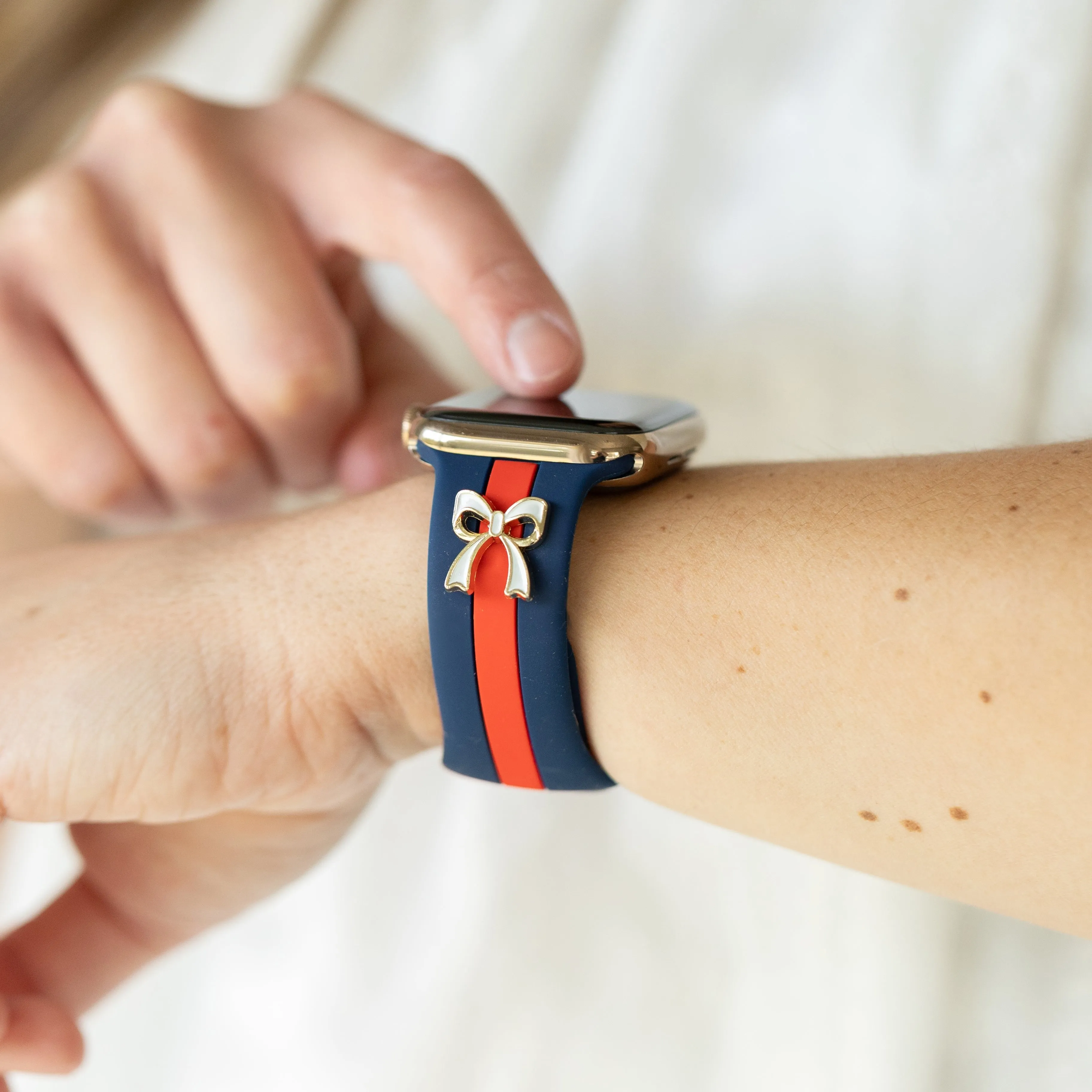 The It Girl Blue and Red Smart Watch Band sold by Strawberry Avocados
