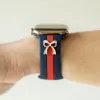 The It Girl Blue and Red Smart Watch Band sold by Strawberry Avocados