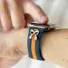 The It Girl Blue & Orange Smart Watch Band sold by Strawberry Avocados