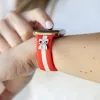 The It Girl Red and White Smart Watch Band sold by Strawberry Avocados