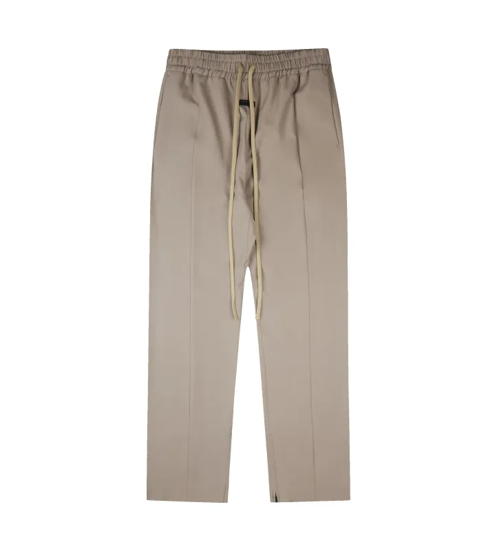 Center Seam Track Pants (Dusty Beige) sold by FOUR Amsterdam