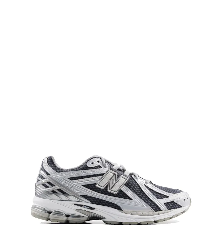 1906R Sneakers in White Castlerock sold by FOUR Amsterdam