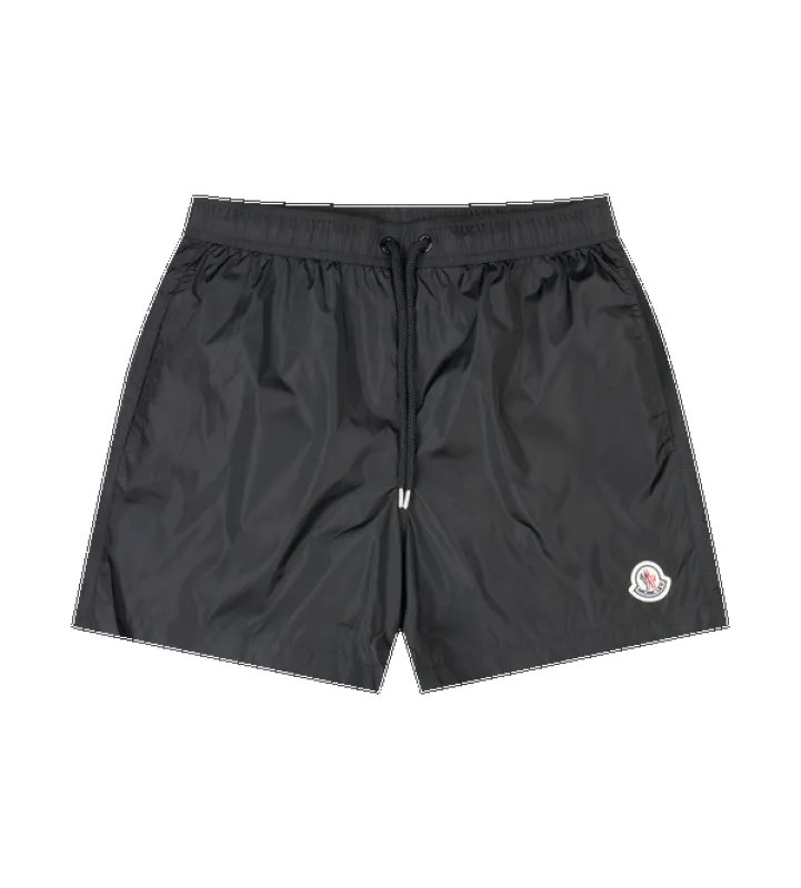 Moncler Logo Patch Swim Shorts in Black sold by FOUR Amsterdam
