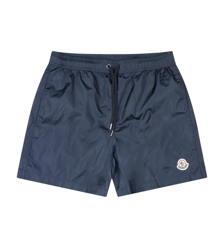 Moncler Logo Patch Swim Shorts in Navy sold by FOUR Amsterdam