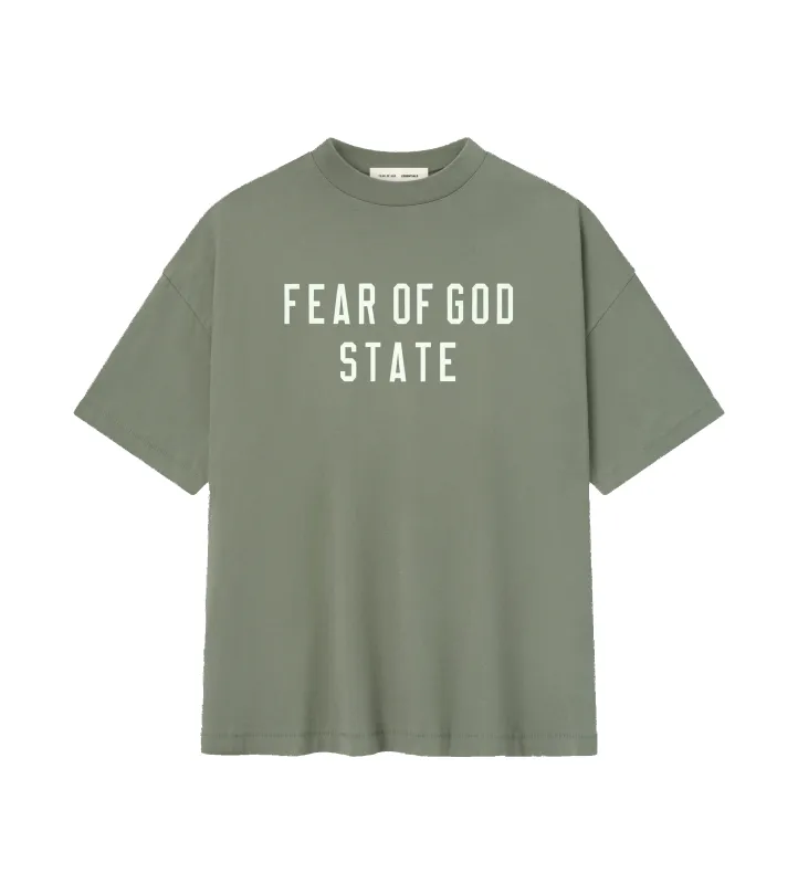 Fear of God ESSENTIALS 90’s Tee in Moss sold by FOUR Amsterdam